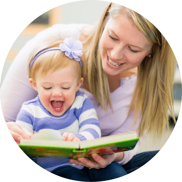 Mother sharing a book with her kid