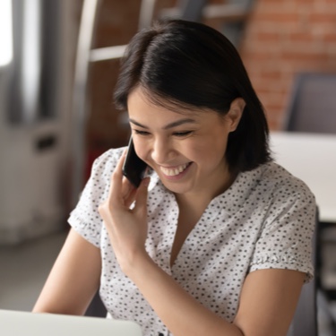 Smiling lady talking on phone