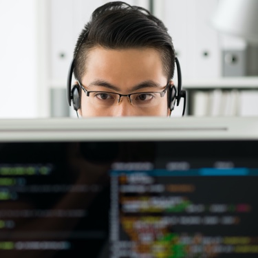 Smiling man wearing headphones